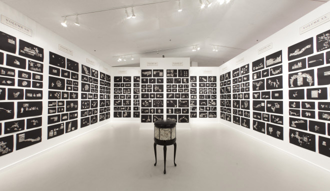 The Funk & Wag from A to Z (installation view), Mel Chin, 2024. Excised printed pages from The Universal Standard Encyclopedia, 1953–56, by Wilfred Funk, Inc., archival water-based glue, paper, 524 collages. Courtesy of the artist.