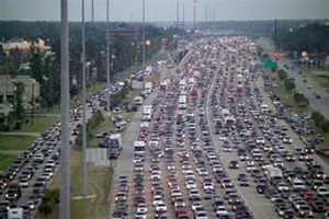 Wider highways attract more cars, congestion increases, and gridlock takes over.