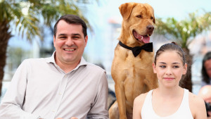 CANNES, FRANCE - MAY 17: (L-R) Director Kornel Mundruczo, Dog actor Hagen and actress Zsofia Psotta attend the "Feher Isten" photocall at the 67th Annual Cannes Film Festival on May 17, 2014 in Cannes, France. (Photo by Andreas Rentz/Getty Images)